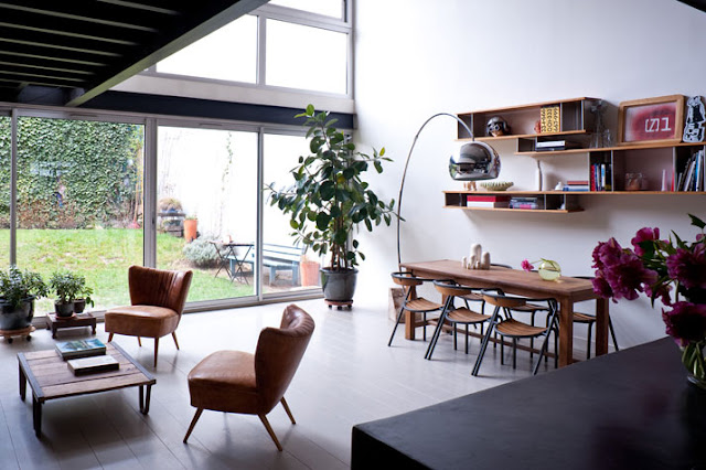 Industriedesign trifft auf Mid-Century Design in Bagnolet: moderne Einrichtung mit Shabby-Chic-Charme