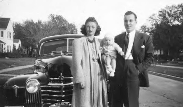 Unknown couple with their car, 1940s