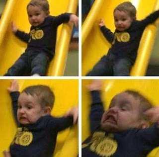 KID ON A SLIDE