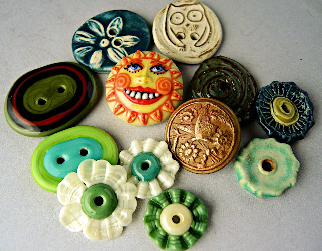 Assorted art buttons.