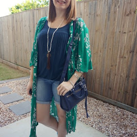 awayfromtheblue Instagram | navy tank and Bermuda denim shorts outfit with green floral duster kimono