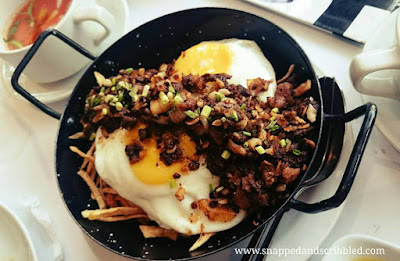 Sisig, Sausage and Egg on a Bed of Shoestring Potatoes at Tapella by Robert Spakowski