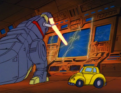 Grimlock blasts Teletraan I with his flame breath while Bumblebee looks on. Screen capture from the Generation 1 cartoon, The Transformers, "S.O.S. Dinobots".