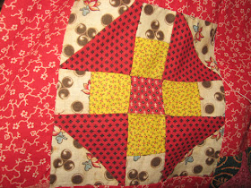 red and chrome yellow antique churndash quilt block