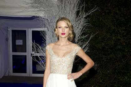 Taylor Swift – Winter Whites Gala in London