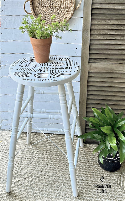 Photo of a Boho style stool upcycle with chalk paint & a Walmart stencil.