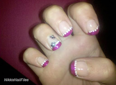 fuschia manicure; pink nails with white flowers;