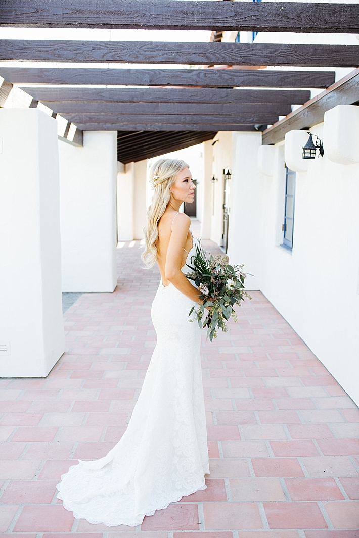 Bride in lace open back wedding dress | Photography: Photography by Ben and Kadin | Wedding Planner: Jessica Lauren Events