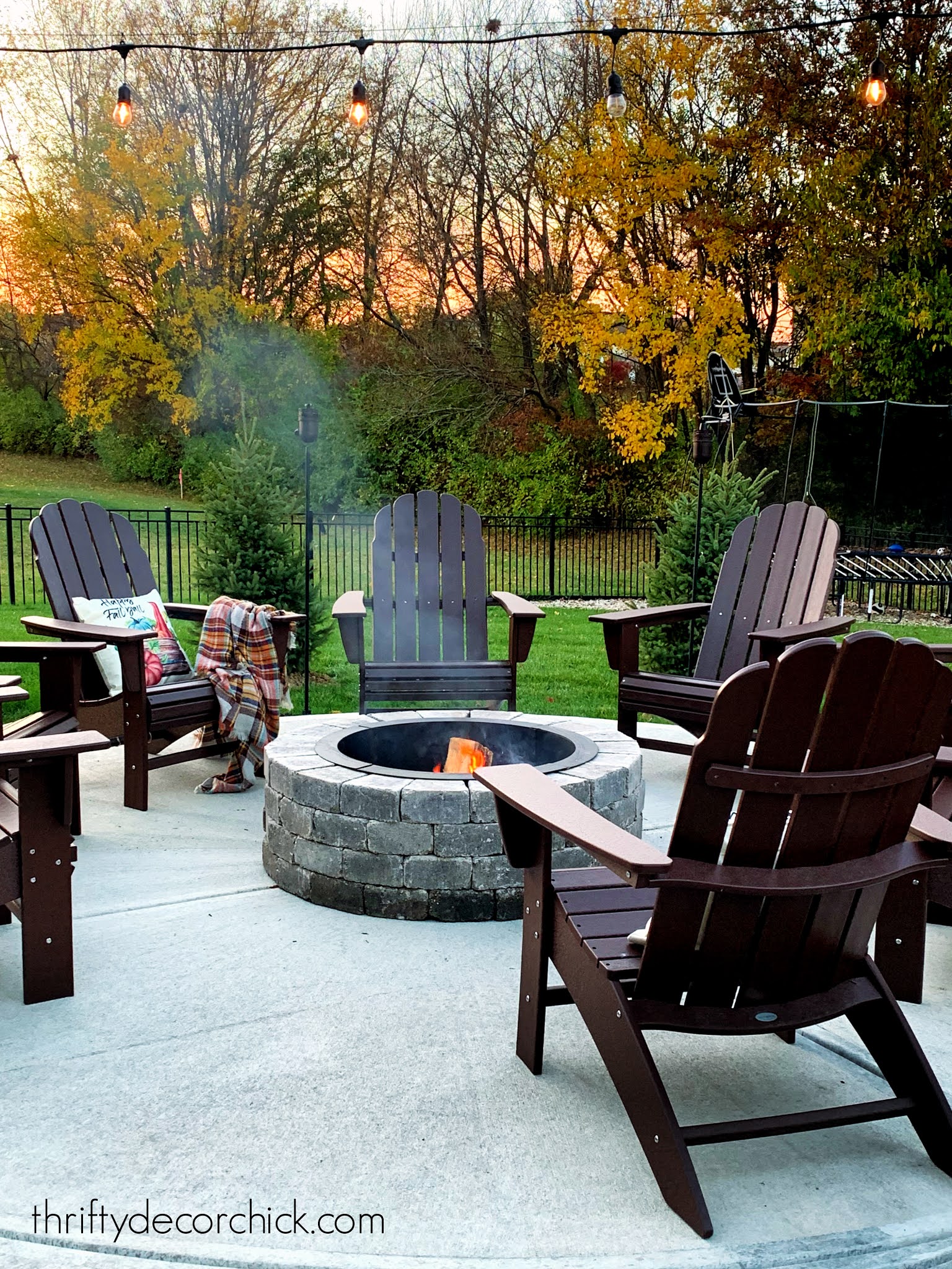 round fire pit patio with chairs