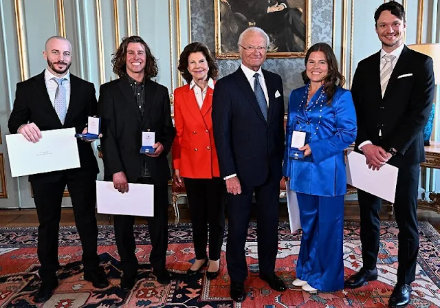 Queen Silvia wore a red double breasted blazer. The Queen wore a tartan blazer. Nils van der Poel and Pernilla Wiberg Bjerke