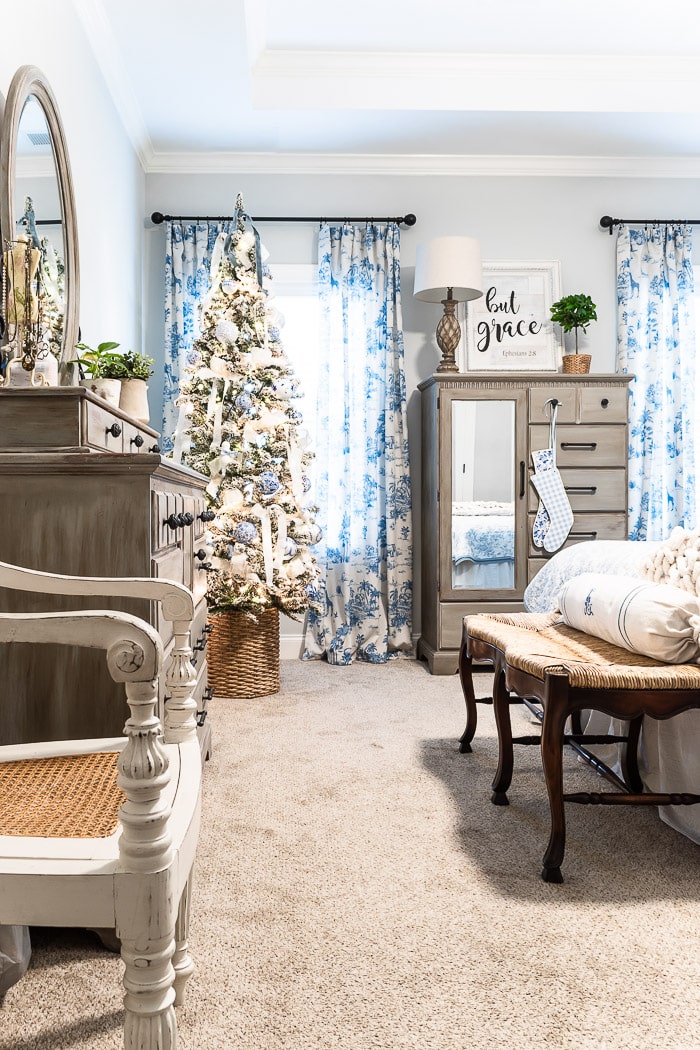 blue and white vintage Christmas tree, blue toile curtains, blue and white wood stockings