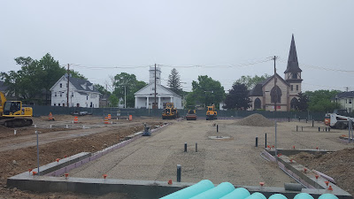 the foundation is in and utility work being done for the new building at 150 Emmons St