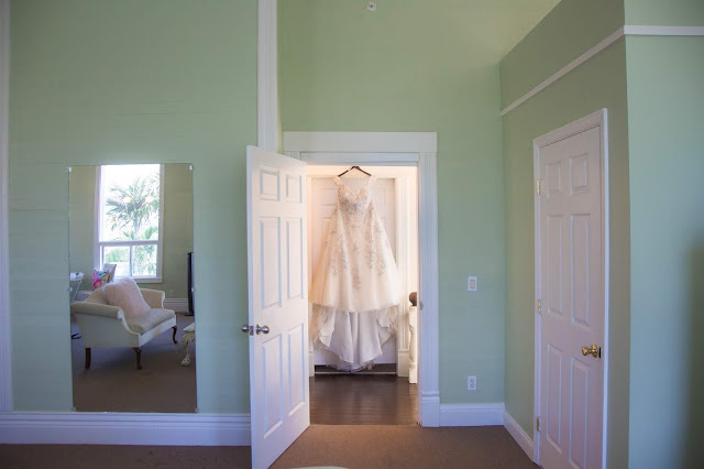 wedding dress in getting ready room at white orchid