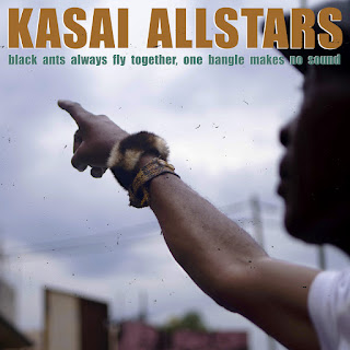 Kasai Allstars "In The 7th Moon, The Chief Turned Into A Swimming Fish And Ate The Head Of His Enemy By Magic" 2008 + "Beware The Fetish"2014 + Kasai Allstars & Orchestre Symphonique Kimbanguiste "Around Félicité" 2017 Soundrack,double LP + "F​é​licité Remixes"2017 +  "Black Ants Always Fly Together, One Bangle Makes No Sound" 2021 + "Black Ants Remixes"EP 2021 Democratic Republic of the Congo,Tradi-Modern (Traditional Congolese music with electric instrumentation),World Music,Soukous