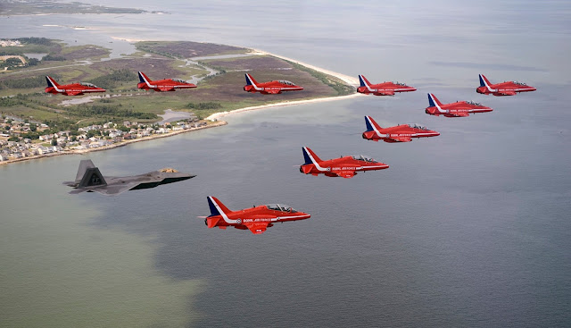 Red Arrows of Royal Air Force Escort USAF F-22