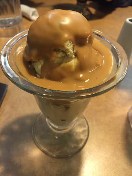 Peanut butter sauce on cookie dough ice cream churned in Rockford, IL.