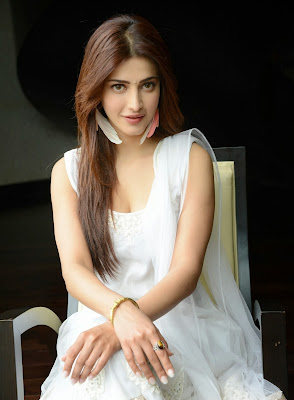 Shruti Haasan, Candid Photoshoot, bollywood actress, Indian Actress, Shruti Haasan Showcasing Her Stunning Figure In White Dress