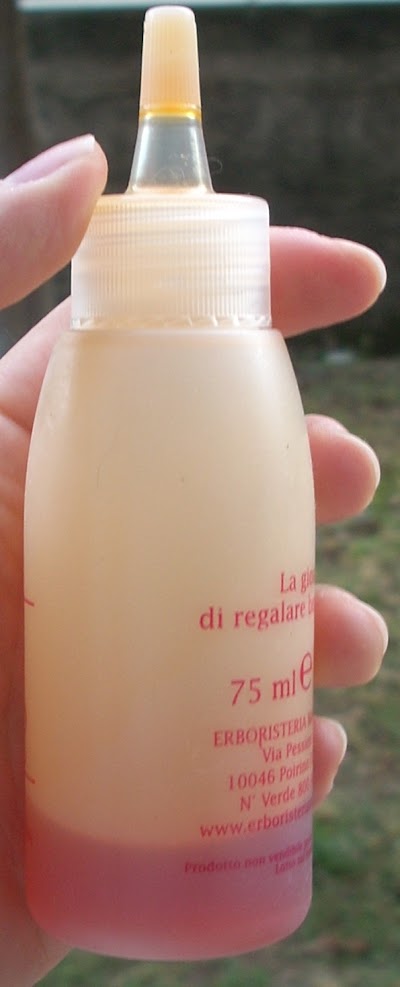 Olio protettivo per la cura dei capelli al sole