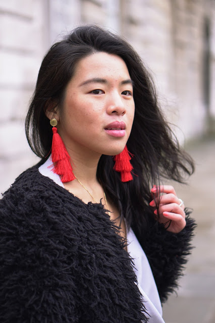 Red tassel statement earrings