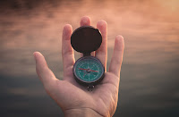 Compass - Photo by Aron Visuals on Unsplash