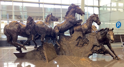 Calgary airport wild horses bronze statue