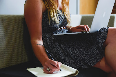 a woman writing