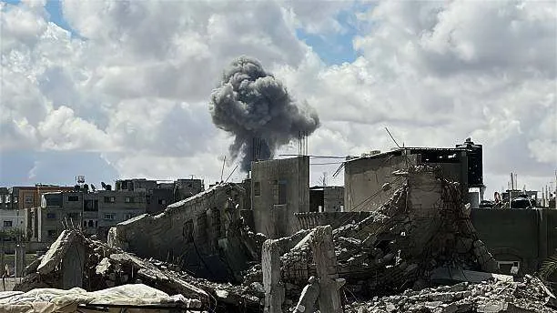 Smoke rises as Palestinians flee from Rafah and Khan Yunis amid continued Israeli attacks in Gaza City, Gaza, on April 14, 2025. Photo by Doaa Albaz/Anadolu