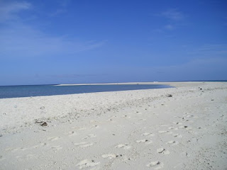 Crescent Shaped white island in camiguin