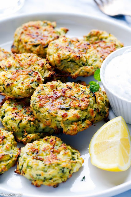 Oven Baked Zucchini And Feta Cakes (Fritters) – so light, simple to make and very addictive. Today’s recipe features two of my favorite ingredients