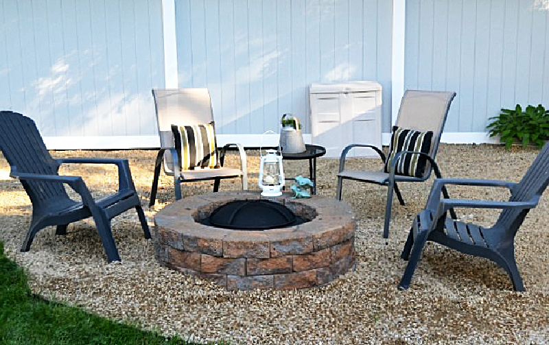fire pit area with Adirondack chairs