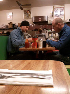 2 guys eating breakfast at Delucas