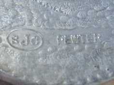 SJC pewter signature