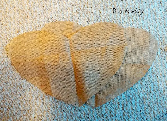 Looking for something unique to hang on your door this Valentines? Make this burlap heart! Step by step directions included at diy beautify!