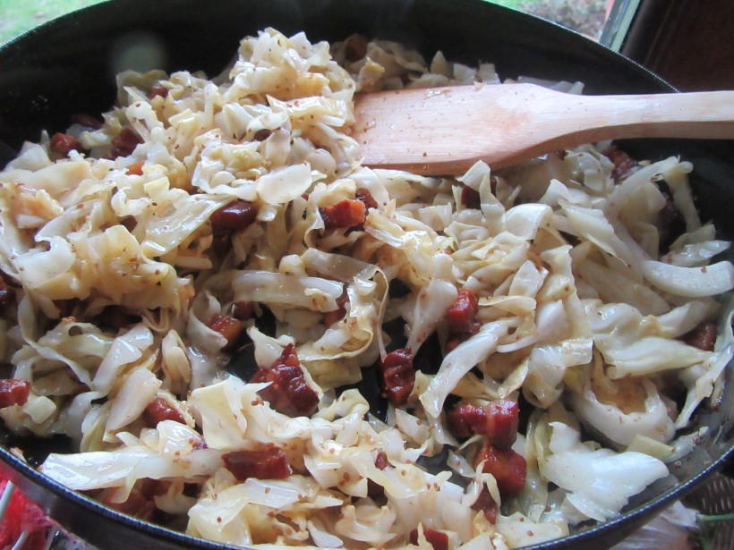 Stir in sauerkraut, caraway seeds and sugar