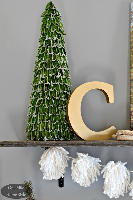 Cozy Winter Decor White Yarn Pom Pom Garland Strung on Rustic Wood Shelves - One Mile Home Style