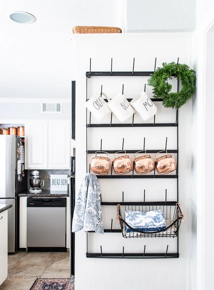 farmhouse modern kitchen with mug rack, copper and vintage blue accessories