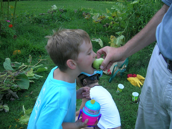 The first bite of our first apple