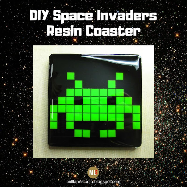 Space Invaders Resin coaster with green alien on black background