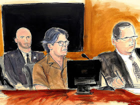 In this courtroom sketch Keith Raniere, second from right, leader of the secretive group NXIVM, attends a court hearing Friday, April 13, 2018, in the Brooklyn borough of New York.