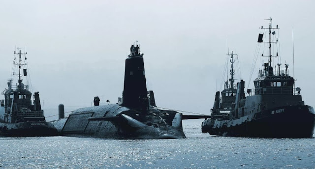 British Navy Nuclear Submarine HMS Victorious Burns, Brings 2 Intercontinental Ballistic Missiles