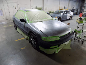 1995 Honda Accord getting masking for paint at Almost Everything Auto Body.