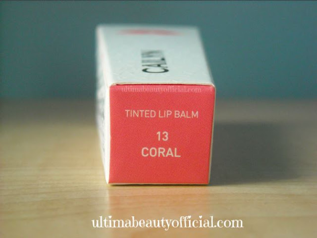 End of Cailyn lip balm box, text reads: "tinted lip balm 13 Coral