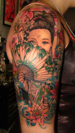 Amazing Female Shoulder Tattoo With Japanese Geisha Tattoo Design Picture 1