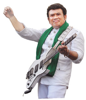 Rhoma Irama sedang bergitar, gambar-yang