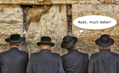 Funny jewish men at the Jerusalem wailing wall praying, one guy urinating joke image