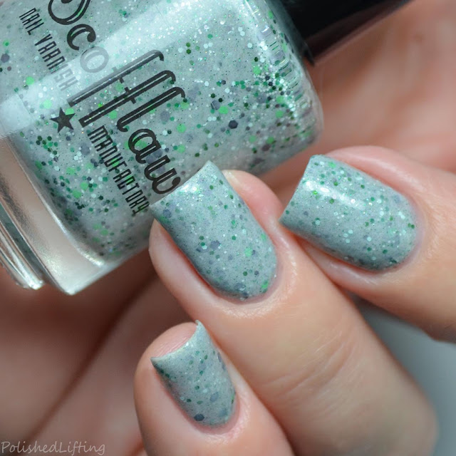 gray nail polish with green glitter