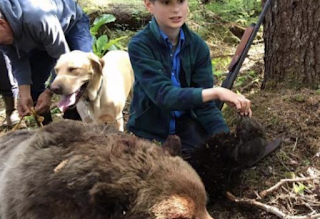 Armed 11-year-old boy saves uncle from charging bear 