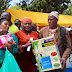 "President M7 Wants You Empowered" ONC Namyalo As She Hands Over Agriculture, Salon & Tailoring Equipment from M7 To NRM Mobilizers Groups.