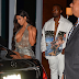 Kim K goes braless again as she attends Kanye West concert in Miami 