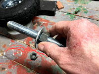 Threading a nut on the rod